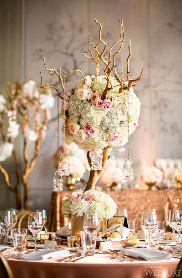 Tall-Light-pink-Mazanita-Branch-with-hanging-candles-wedding-centerpiece-idea