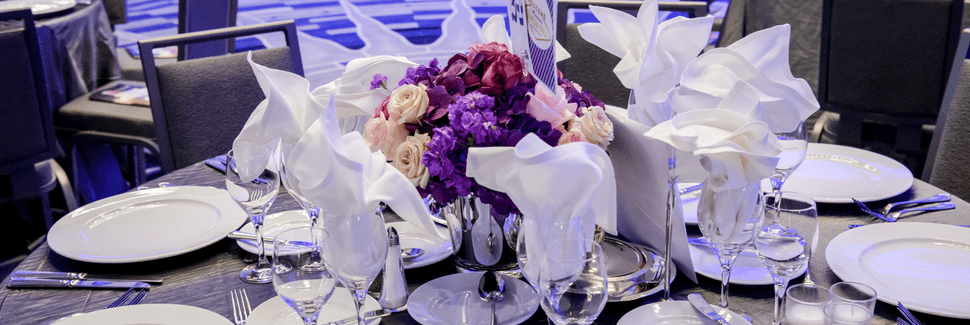 Event flowers in shades of purple and pink designed by Beneva Weddings & Events in Sarasota, FL